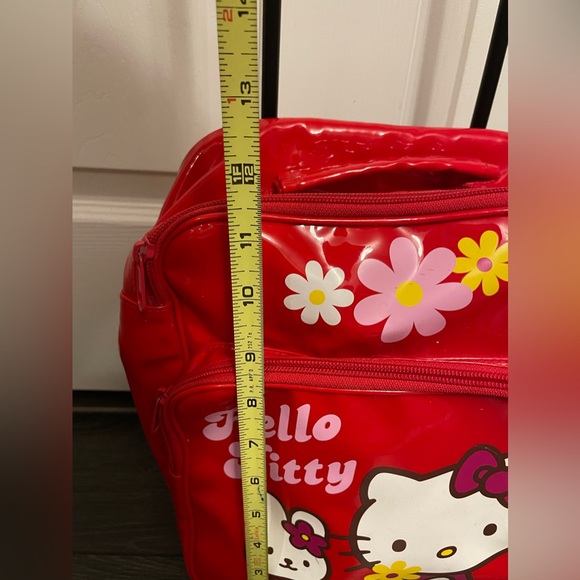 Hello Kitty 12” tall suitcase with wheels. - Picture 4 of 12
